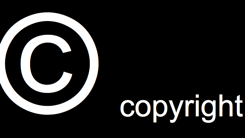 white copyright symbol and text on black background