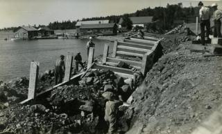 Works Progress Administration workers building the break wall at the harbor, Grand Marais, Minnesota
