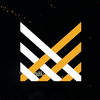 The Minitex 50th anniversary logo, "Minitex, Celebrating 50 Years," set in front of a fireworks in the night sky.