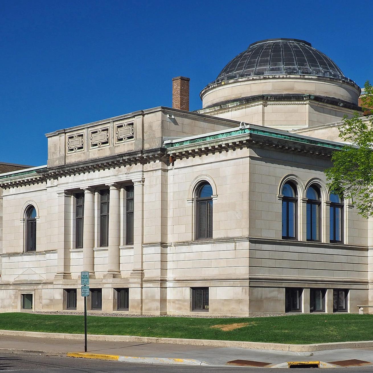 A photograph of the Winona Public Library's neoclassical facade.