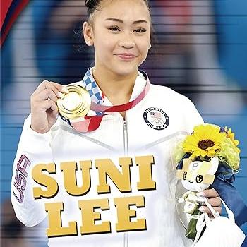 Suni Lee holding flowers and a gold medal