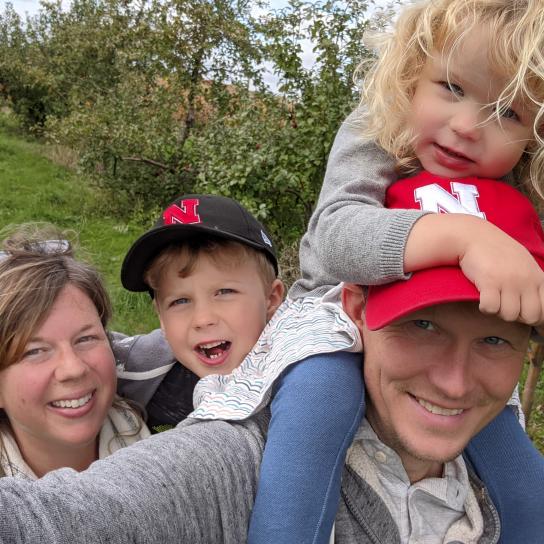 A photograph of Zach Miller and his family.
